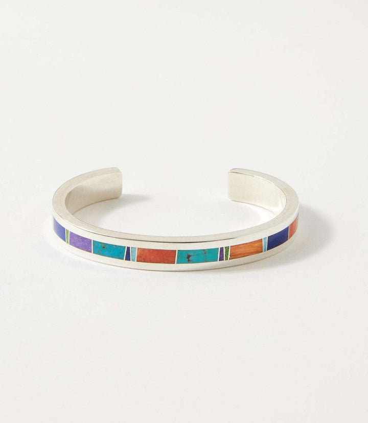 Multistone inlay sterling silver cuff bracelet with colorful stones including lapis, coral, turquoise, and charoite