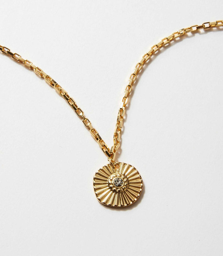 Gold plated Radiant Sun Pendant necklace with sun-shaped charm and radiant design on chain