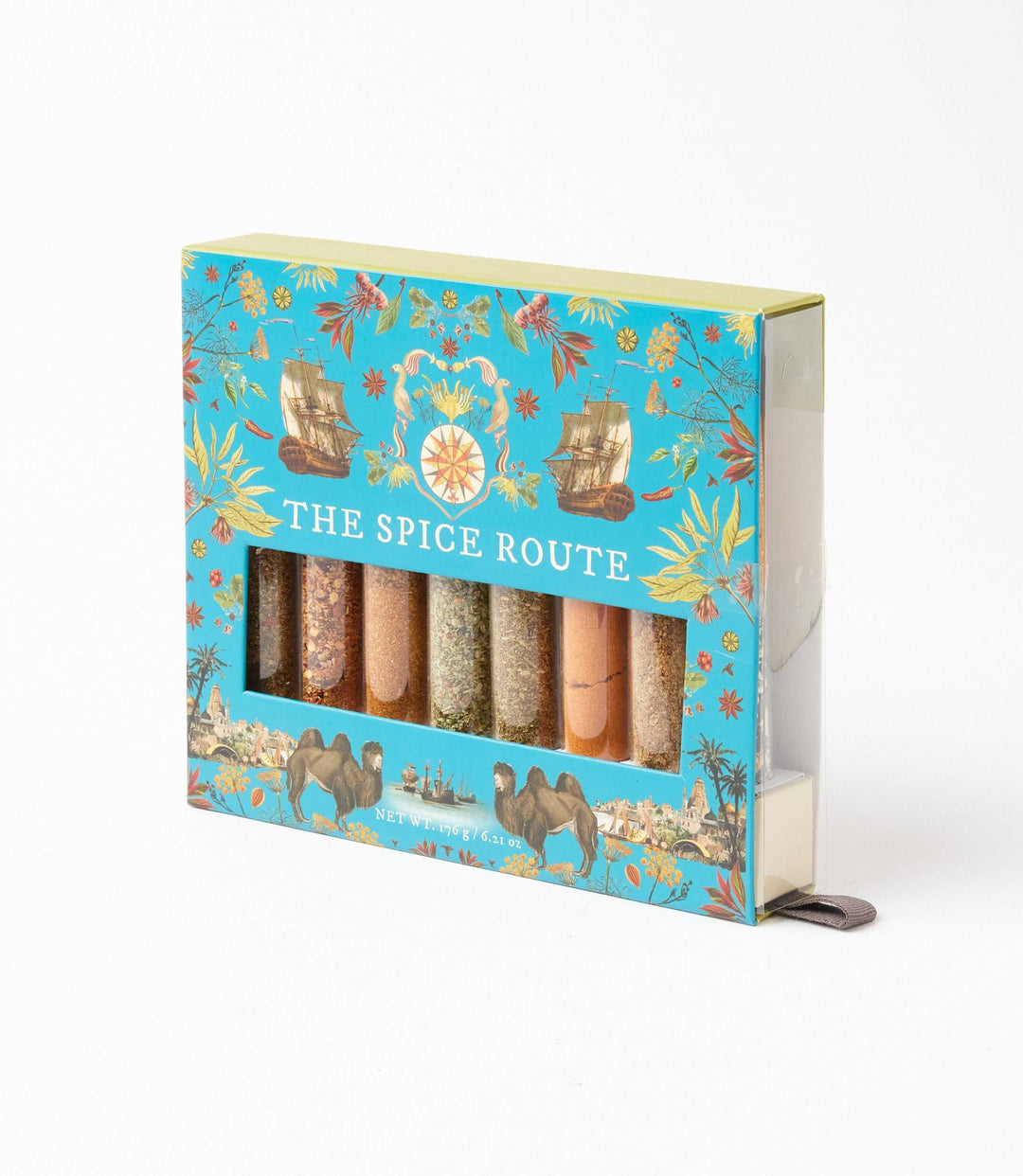 The Spice Route Gift Set with 8 exotic spice blends in reusable glass tubes, vibrant packaging with historic spice route design