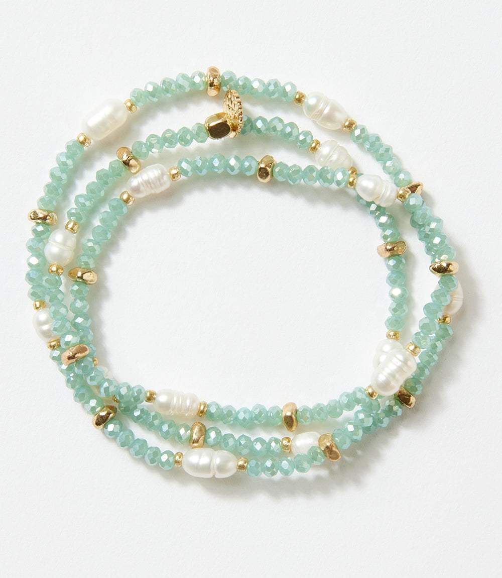 Beaded gemstone and pearl stretch bracelet with aqua beads, pearls, and gold accents, versatile as bracelet or necklace