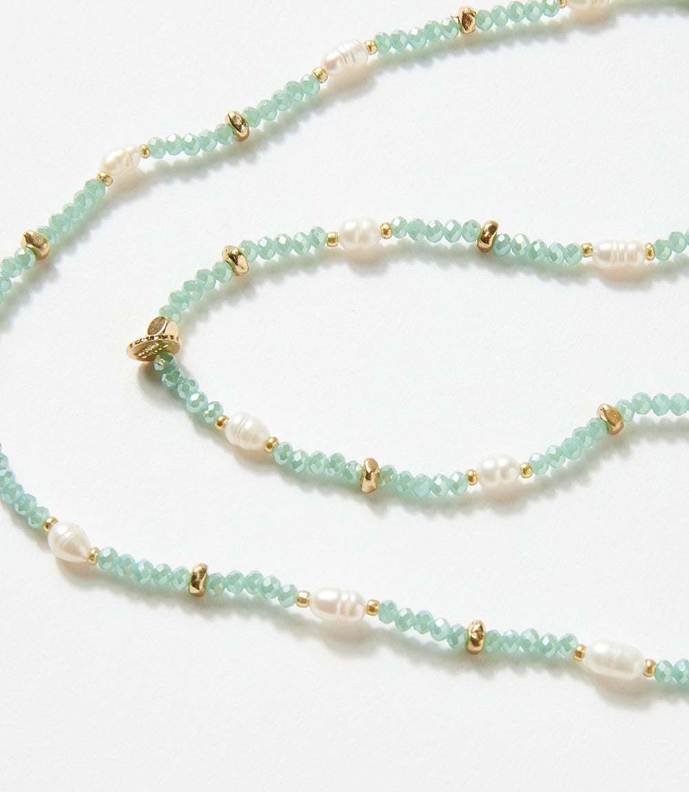 Beaded gemstone and pearl stretch bracelet with metal and crystal beads, designed to wear as bracelet or necklace.