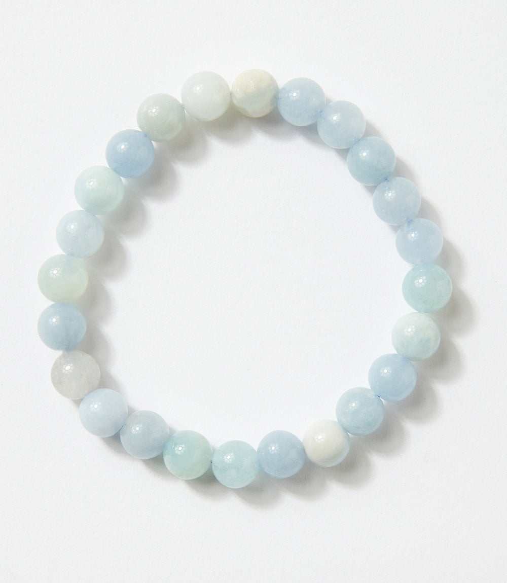 Beaded stretch bracelet with light blue and white aquamarine beads, 8mm size, minimalist design