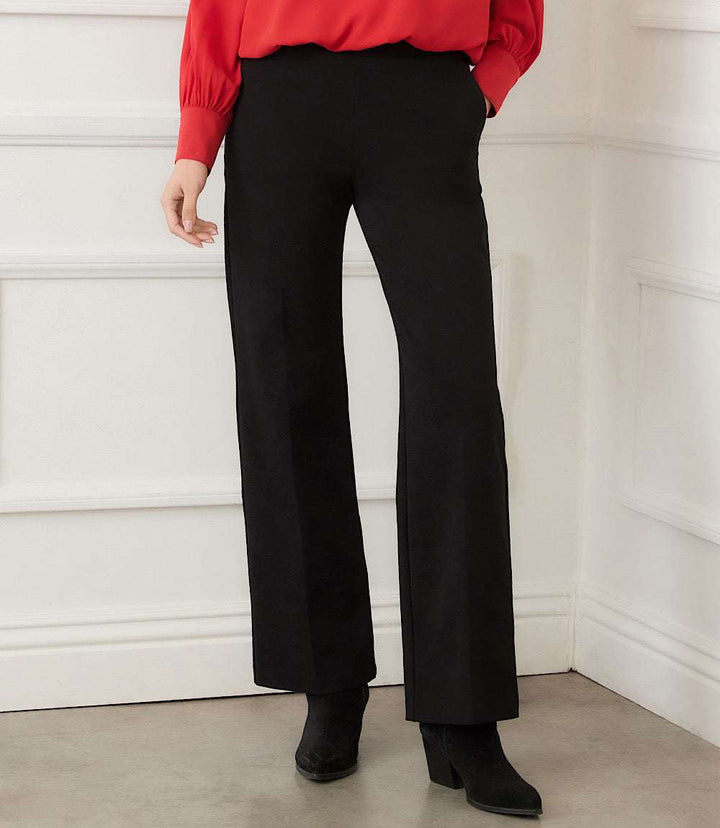 Emily Straight Leg Pants in black with high waist, elastic waistband, side pockets, and tailored straight-leg fit