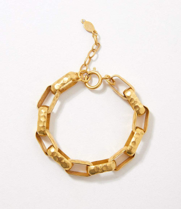 Chunky hammered gold chain link bracelet with adjustable clasp and textured design