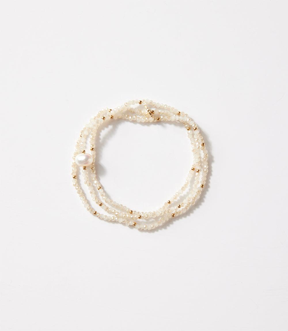 Crystal bead stretch bracelet with pearl and metal bead accents, versatile design for wrist or necklace wear