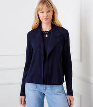 Soft wide-rib knit ribbed jacket with open front and relaxed lapel, long sleeves, and comfortable stretch fit.