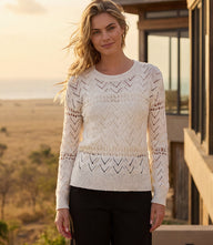 Lightweight crochet sweater with open-knit design and crew neckline for feminine layering