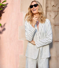 Linen blend stripe blazer with long sleeves, single-button front, sharp lapels, and welt pockets