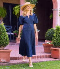 Elegant denim puff sleeve midi dress with gathered shoulders and fitted waist