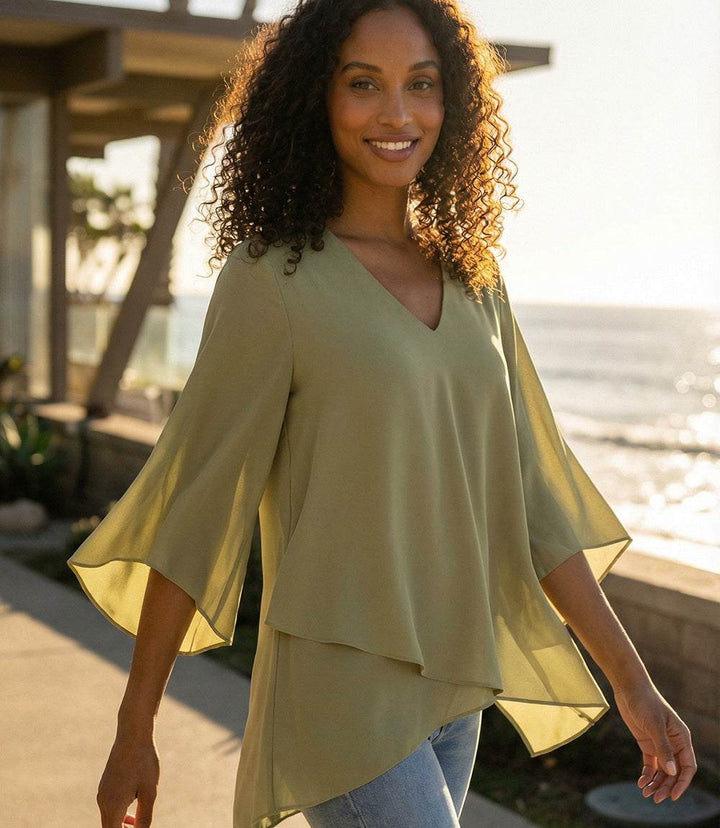 Bracelet Sleeve Asymmetric Top in silky crepe with flare sleeves and layered asymmetrical hem