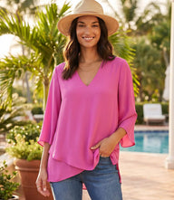 Woman wearing silky crepe Bracelet Sleeve Asymmetric Top with V-neck and layered asymmetrical hem