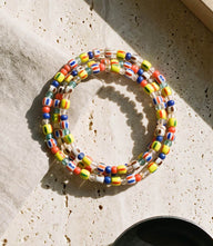 Colorful glass bead wrap bracelet coiled for wrist, lightweight and vibrant accessory