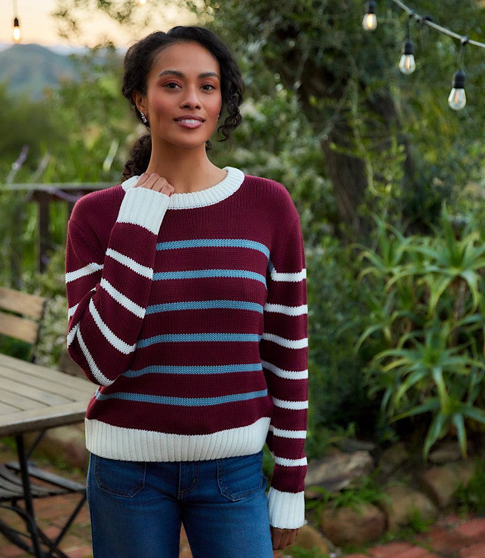 Stripe crewneck sweater in wine with white and blue horizontal stripes, relaxed fit, and ribbed hem