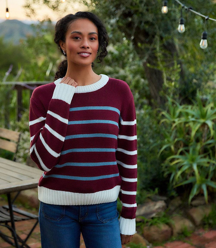Stripe crewneck sweater in wine with white and blue horizontal stripes, relaxed fit, and ribbed hem