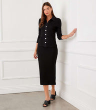 Ribbed side-slit midi skirt with elastic waistband and body-skimming fit