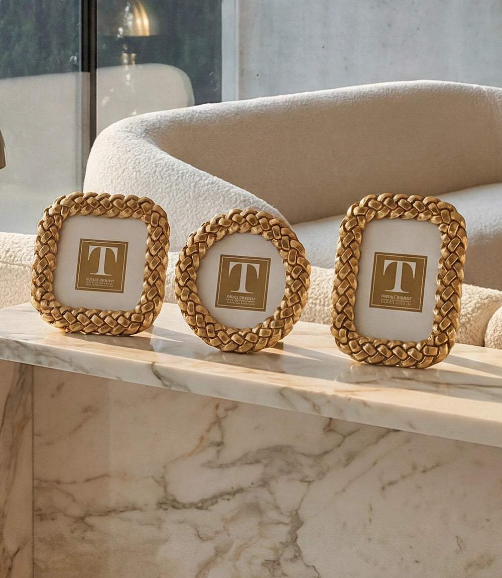 Set of three braided picture frames with gold-tone woven design and velvet backing