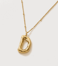 Gold bubble letter charm necklace with 16K gold plating on stainless steel