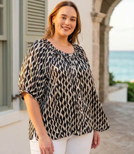 Plus size satin short sleeve peasant top with wavy stripe print and gathered neckline