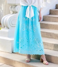 Lightweight cut-out embroidery midi skirt with elastic waistband and side pockets in off white cotton voile