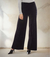 Black crushed velvet pants with elastic waistband and wide-leg fit for women