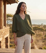 Petite size layered sleeve asymmetric top in silky crepe with V-neck and gathered shoulders
