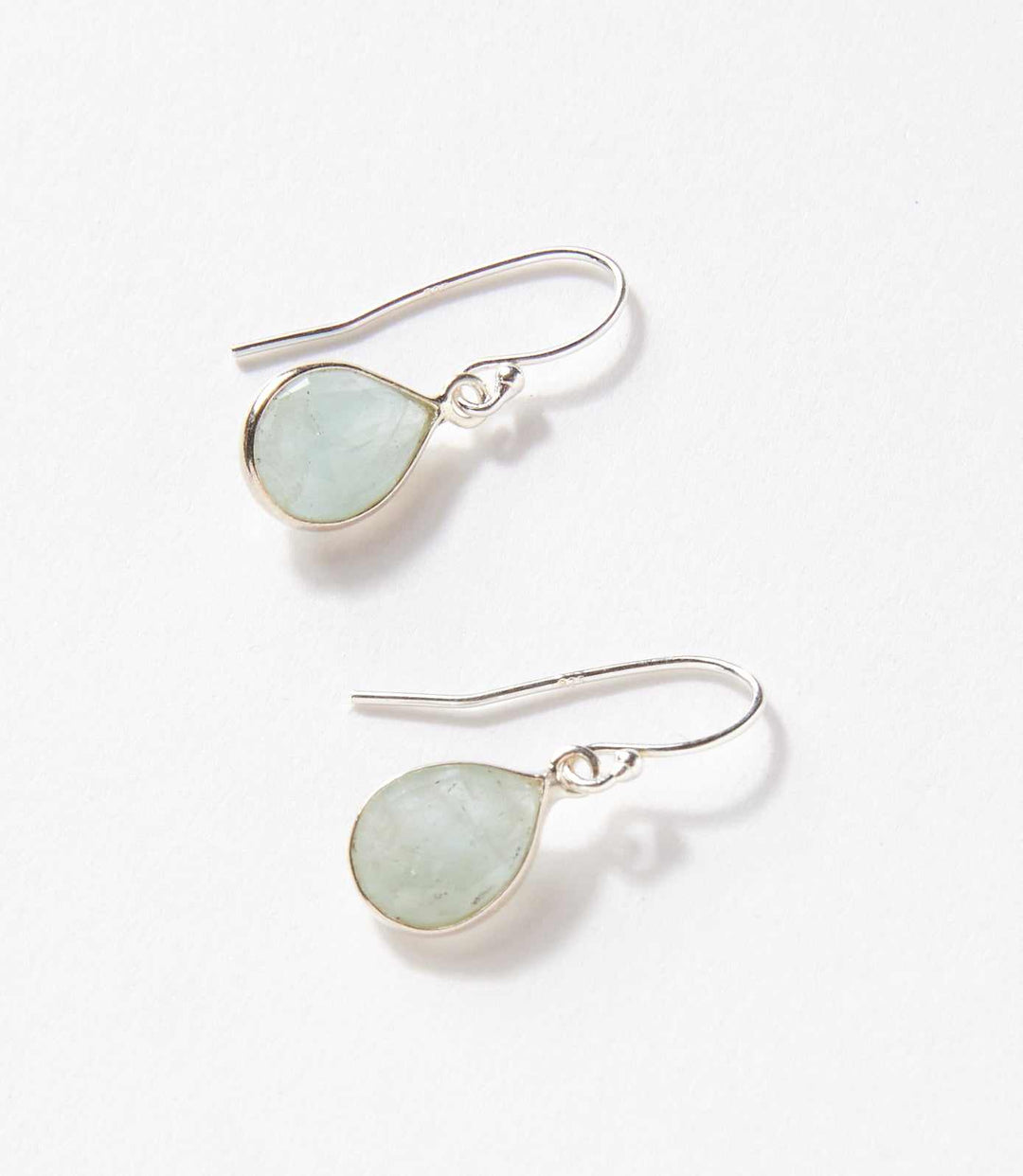Faceted aquamarine teardrop earrings set in sterling silver with soft aqua gemstones