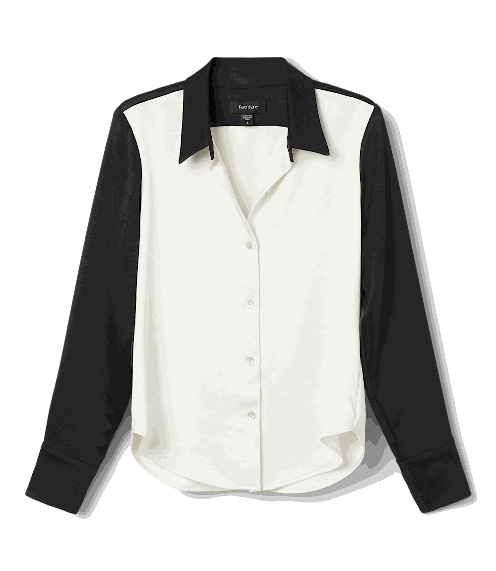 Long sleeve satin colorblock shirt with black sleeves and collar and white body, relaxed fit, button-down front.