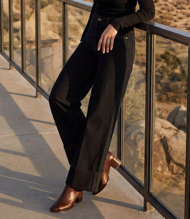 High-rise cuffed cropped wide-leg jeans in stretch denim with five-pocket styling and bold cuffed hems