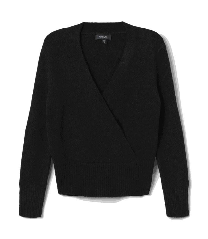 Black faux wrap sweater with crossover V-neckline, long drop shoulder sleeves, and wide ribbed hem and cuffs.