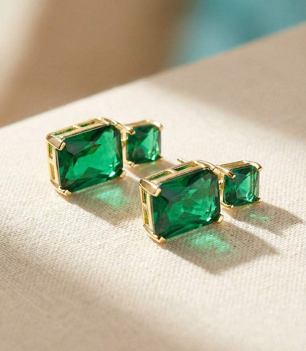 Princess cut drop earrings with emerald gemstones and 14K gold plated setting
