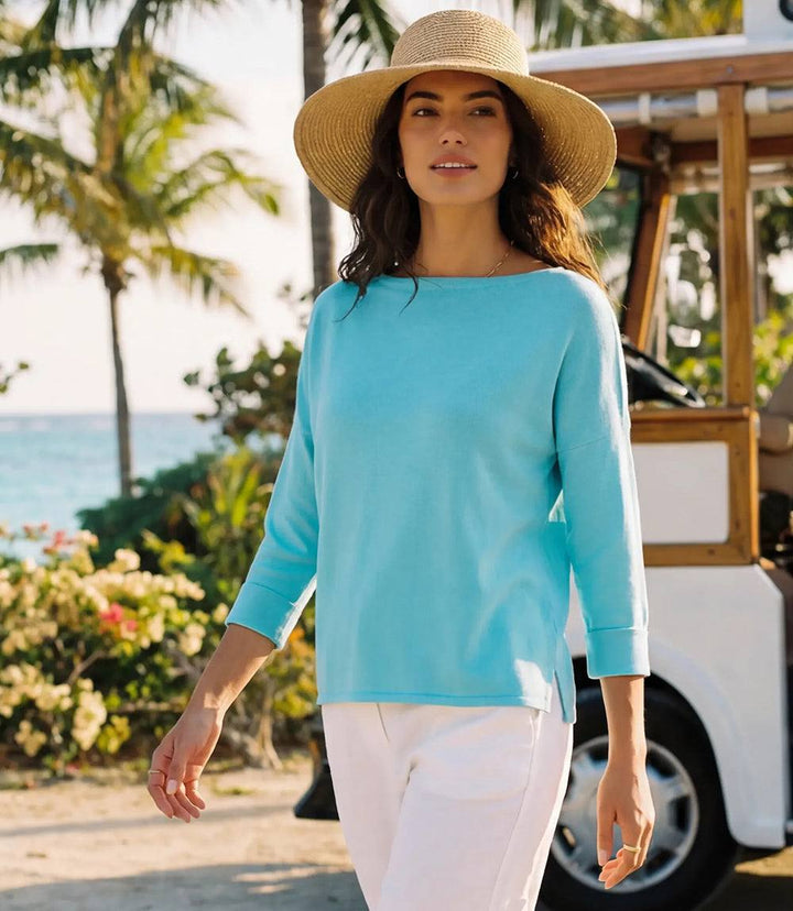 Close-up of ribbed boatneck top in soft cotton-modal fabric with drop shoulder sleeves and side slits