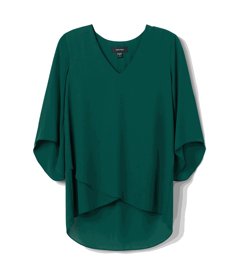Petite asymmetric top with bracelet sleeves, silky crepe fabric, V-neck, and layered hem in dark green.