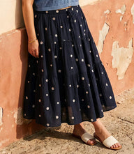 Plus size navy embroidered tiered midi skirt with elastic waist and front slit