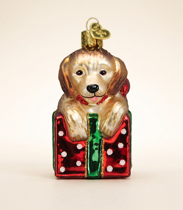 Golden Puppy Surprise Glass Ornament