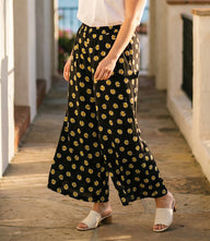 Plus size wide-leg pants black yellow floral print with elastic waistband and side pockets