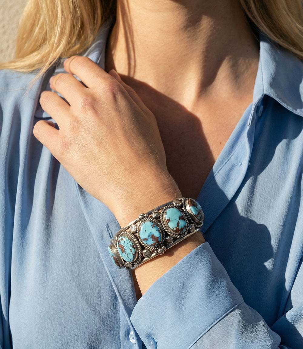 Golden Hill Turquoise cuff bracelet with sterling silver and five oval-cut stones