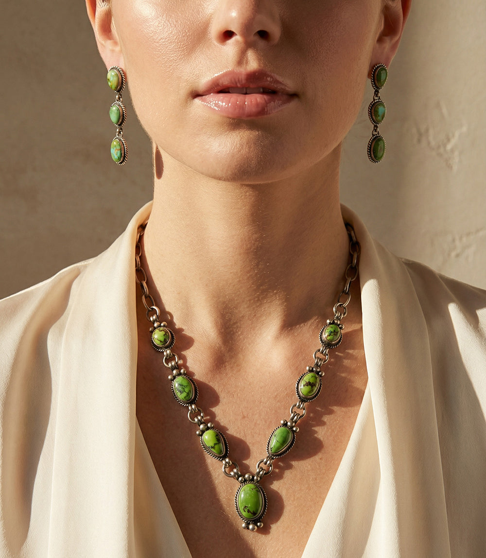 Sterling silver green turquoise necklace and earring set with detailed bezels and hook closure