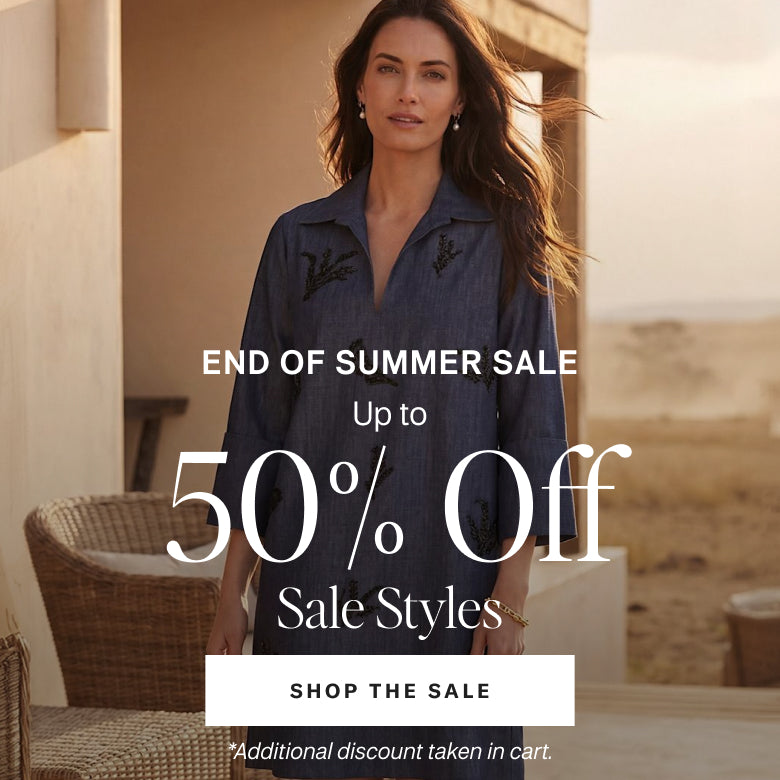 A woman stands outdoors wearing a dark blue denim shirt-jacket with black embroidered leaf motifs. Large sale text overlays the center: 'END OF SUMMER SALE Up to 50% Off Sale Styles' with a 'SHOP THE SALE' button below.
