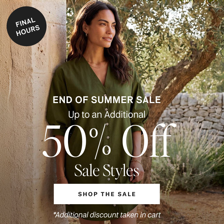 A woman wearing an olive green V-neck top stands outdoors against a stone wall and tree, with promotional sale text overlaid including 'END OF SUMMER SALE', '50% Off', and 'SHOP THE SALE'.