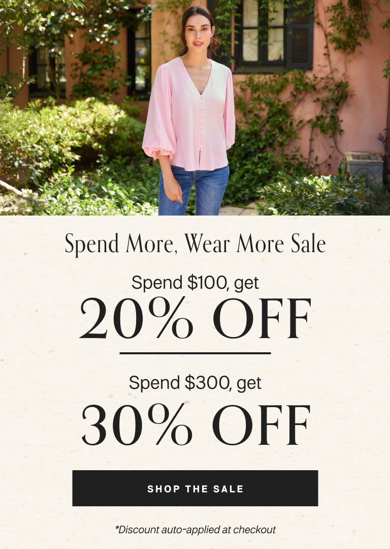 Woman in pink blouse and blue jeans standing outdoors with promotional text overlay.