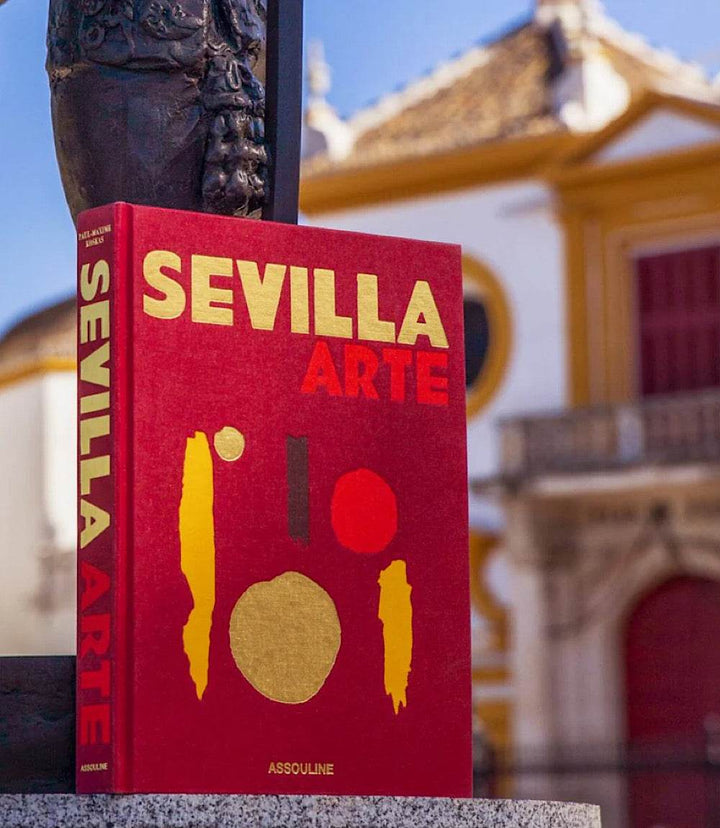 Sevilla Arte book showcasing vibrant culture and rich heritage of Sevilla in a bright red cover