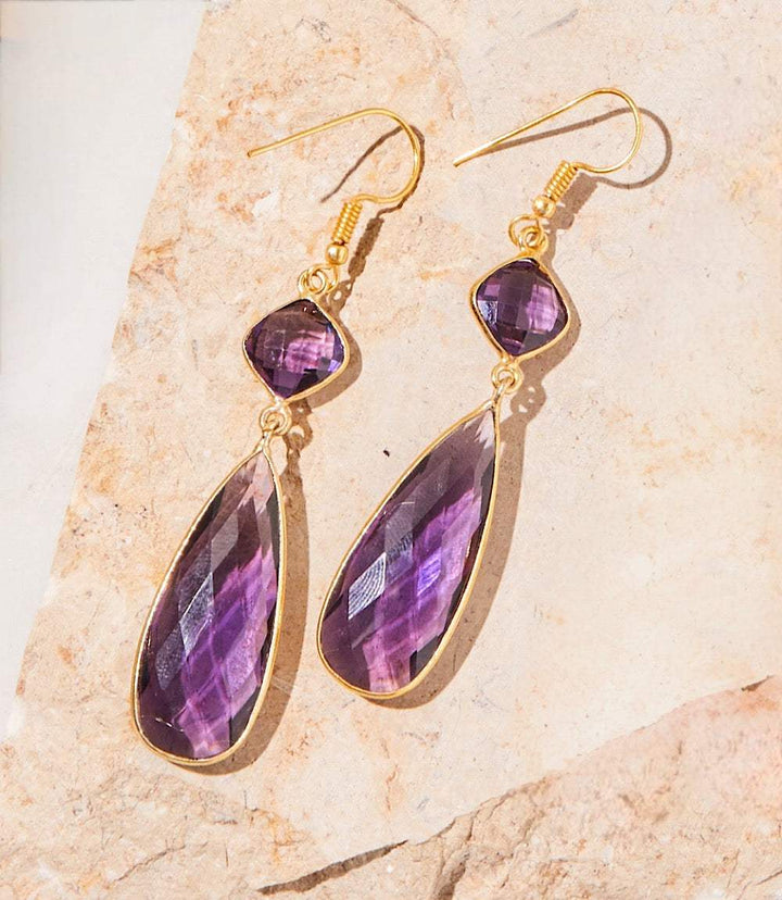 Gold plated gemstone drop earrings with two tiers of faceted purple glass stones, 3 inches long, elegant and sophisticated design