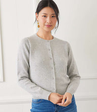 Pearl cardigan sweater with crew neck, button-down front, long sleeves, and pearl embellishments