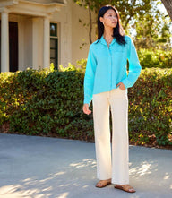 Petite full length wide-leg jeans in stretch denim with high-rise waist and five pockets