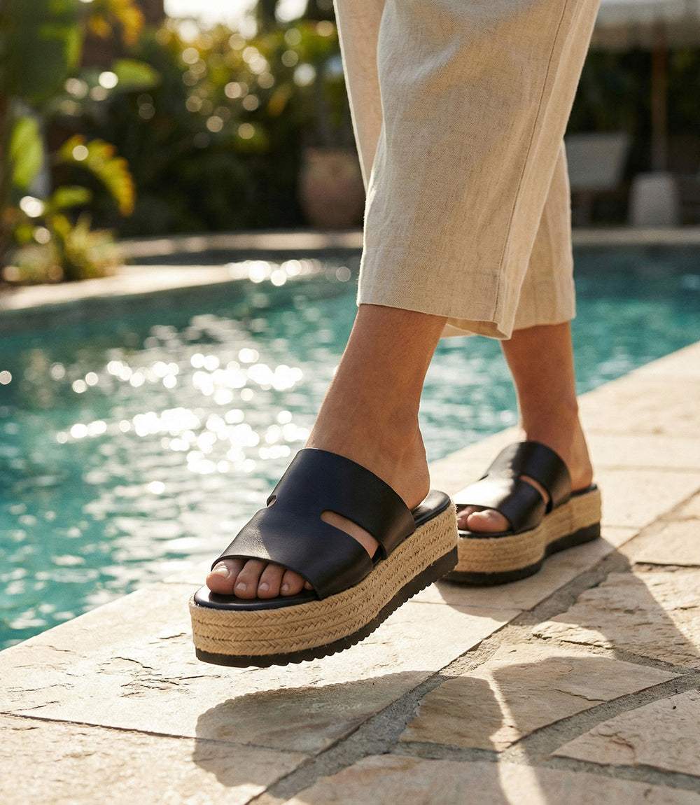 Black Leather Espadrille Slides with round toe and 1.57-inch heel, slip-on design for comfort and style