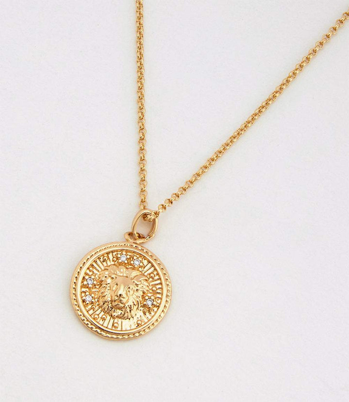 Gold 18K Leo Coin Necklace with micro pave cubic zirconia stones and lion zodiac design on pendant