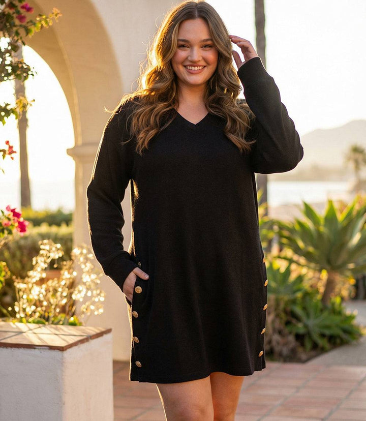 Plus size long sleeve V-neck sweater dress with gold-tone button detail and relaxed straight silhouette