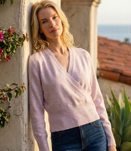 Sequin wrap sweater with crossover V-neck and subtle shimmer detailing