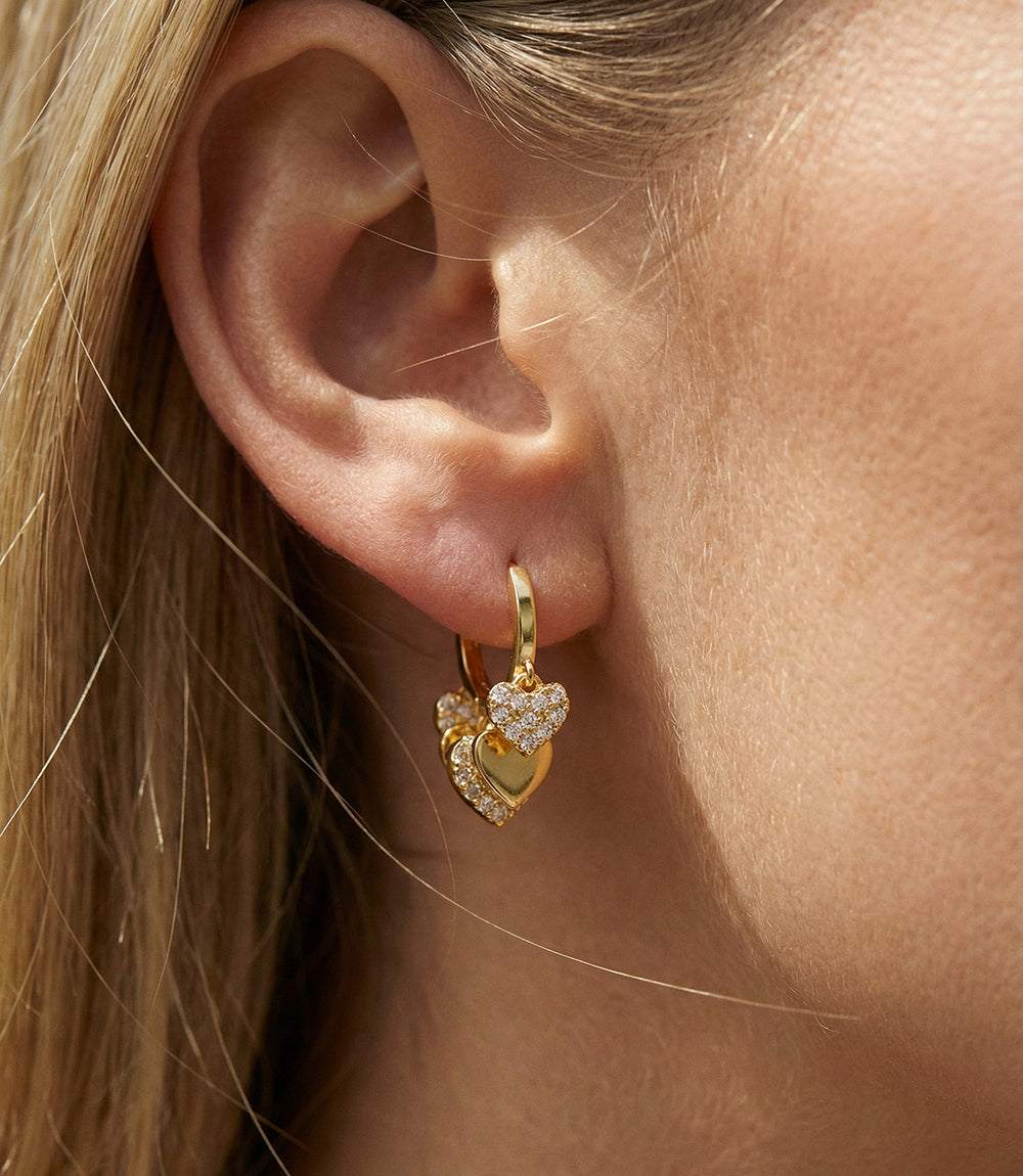Gold vermeil Crystal Huggie Earrings with cubic zirconia hearts, 1-inch hoops, elegant and modern design