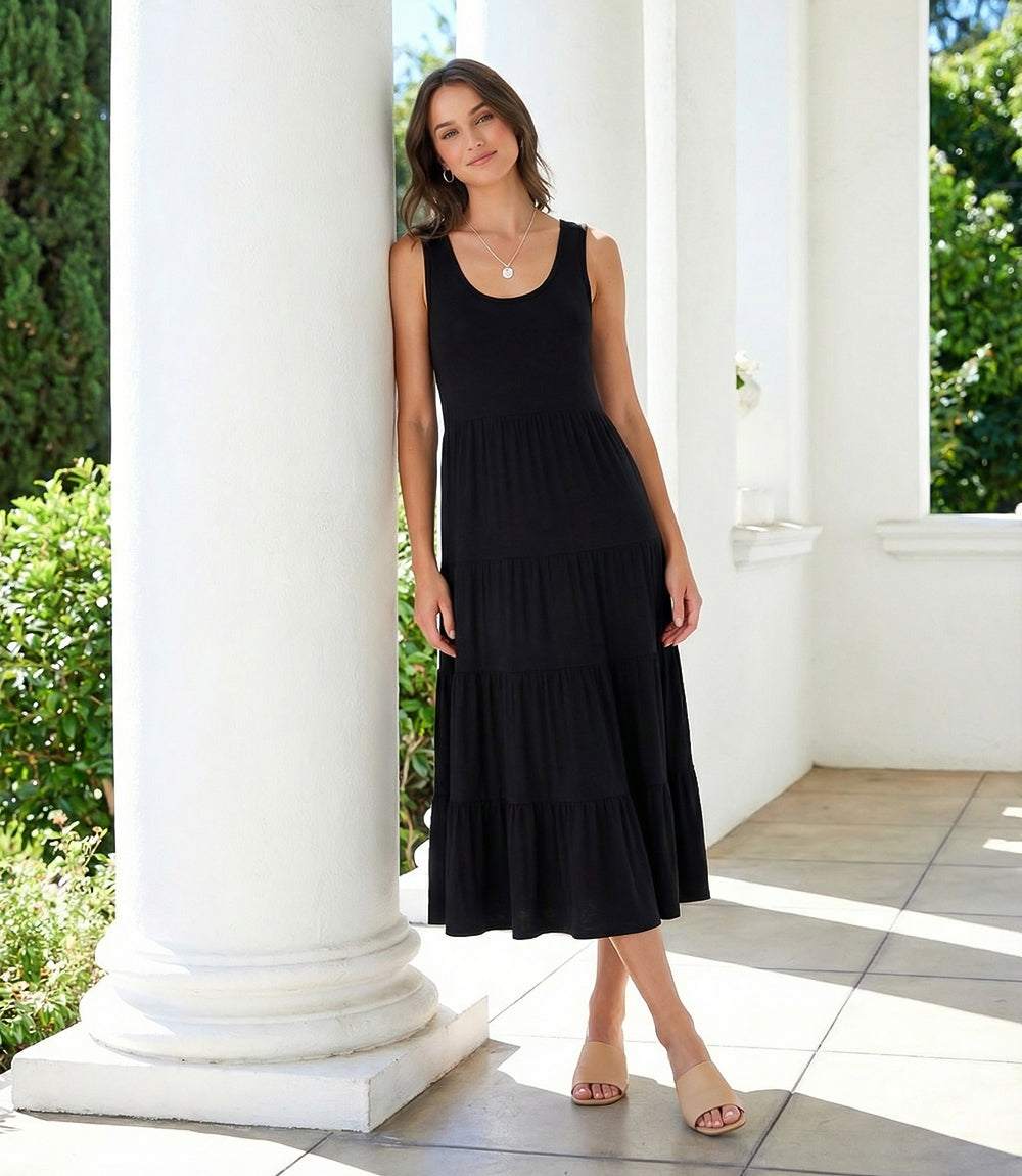 Sleeveless tiered midi dress in stretchy knit fabric with flouncy hem and scoop neckline